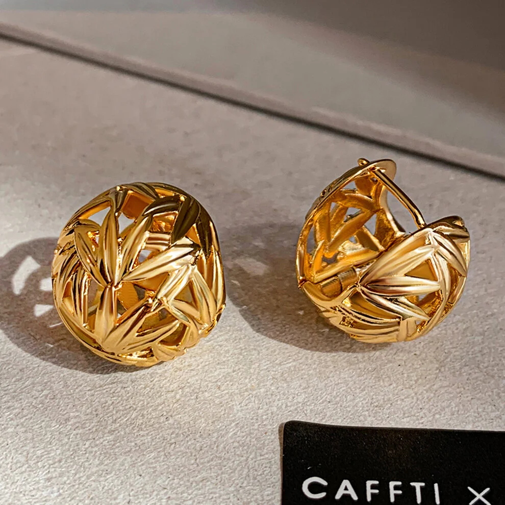 Close-up of PVD coated rose gold necklace showing smooth finish and durability